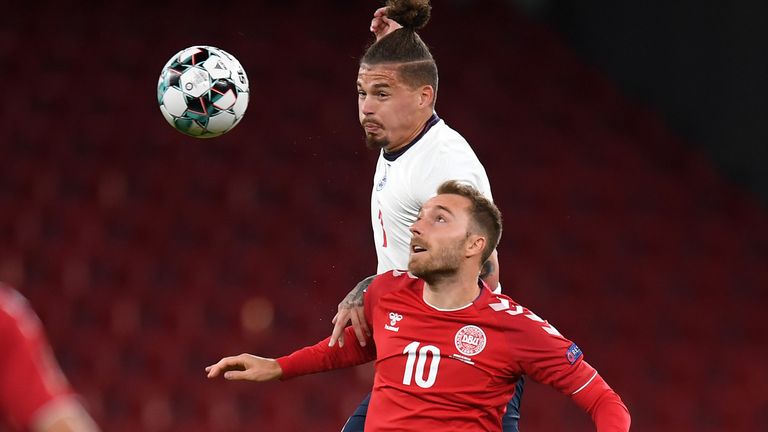  Kalvin Phillips and Christian Eriksen battle for possession 