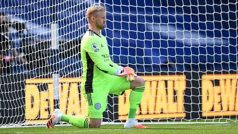 Kasper Schmeichel takes a knee before Leicester's opening day match against West Brom