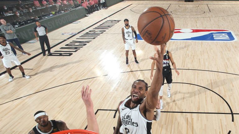 Kawhi Leonard of the LA Clippers shoots the ball against the Denver Nuggets during Round Two, Game Four of the Western Conference Semifinals