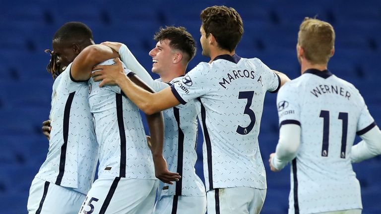 Kurt Zouma celebrates with team-mates after scoring Chelsea's third goal