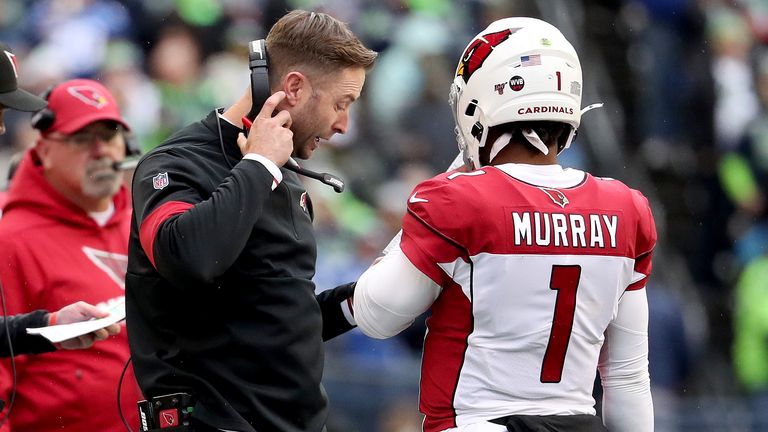 Head coach Kliff Kingsbury and Murray talk on the sideline