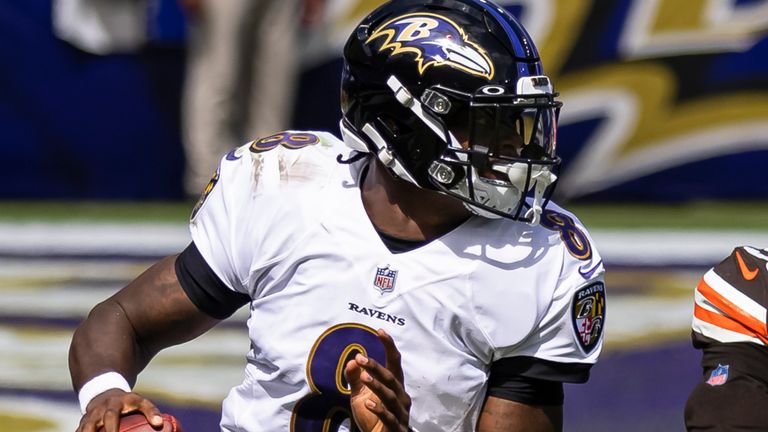 BALTIMORE, MD - SEPTEMBER 13: Lamar Jackson #8 of the Baltimore Ravens scrambles against Myles Garrett #95 of the Cleveland Browns during the first half at M&T Bank Stadium on September 13, 2020 in Baltimore, Maryland. (Photo by Scott Taetsch/Getty Images)