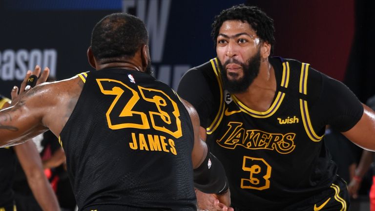 LeBron James and Anthony Davis celebrate during the Lakers&#39; Game 2 victory over the Rockets