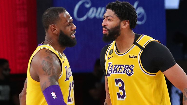 LeBron James and Anthony Davis celebrate a play during the Lakers&#39; Game 2 win over the Denver Nuggets in the Western Conference Finals