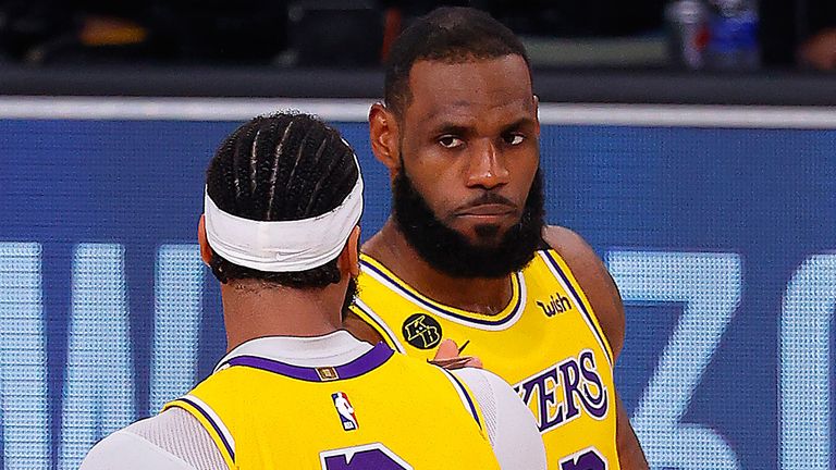 LeBron James and Anthony Davis share an exchange during the Lakers&#39; Game 4 win over the Nuggets