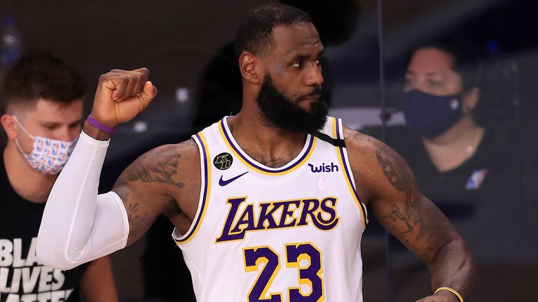 LeBron James celebrates a play during the Lakers' Game 3 win over the Rockets