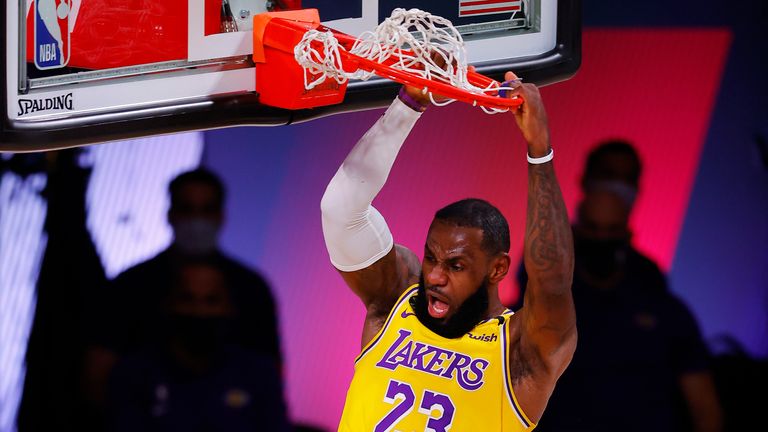 LeBron James of the Los Angeles Lakers dunks against the Denver Nuggets during the second quarter in Game One of the Western Conference Finals