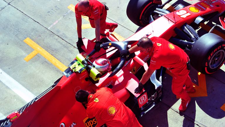 Charles Leclerc of Monaco driving the (16) Scuderia Ferrari SF1000 is pushed back into the garage during qualifying for the F1 Grand Prix of Italy at Autodromo di Monza on September 05, 2020 in Monza, Italy. 