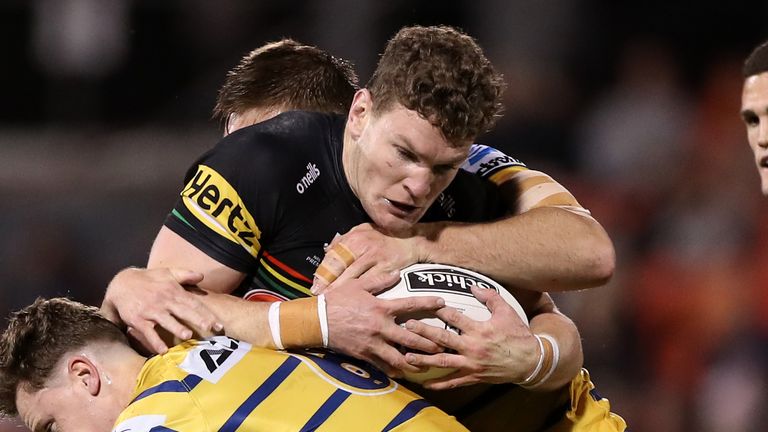 PENRITH, AUSTRALIA - SEPTEMBER 11: Liam Martin of the Panthers is tackled during the round 18 NRL match between the Penrith Panthers and the Parramatta Eels at Panthers Stadium on September 11, 2020 in Penrith, Australia. (Photo by Mark Kolbe/Getty Images)