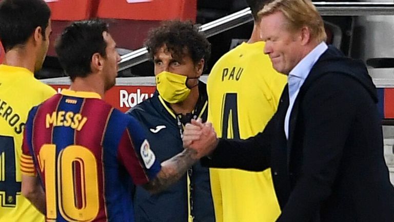 Lionel Messi shakes hands with Ronald Koeman after the game