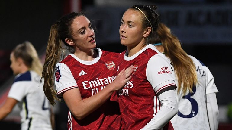 Lisa Evans celebrates scoring Arsenal's fourth goal with Caitlin Foord