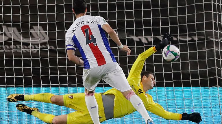 Asmir Begovic saved Luka Milivojevic's second penalty to win the shootout for Bournemouth