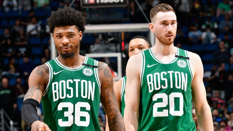 Marcus Smart and Gordon Hayward pictured in regular-season action for the Boston Celtics