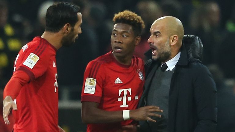 Medhi Benatia (left) clashes with Pep Guardiola during Bayern Munich&#39;s Bundesliga match against Borussia Dortmund on March 5, 2016