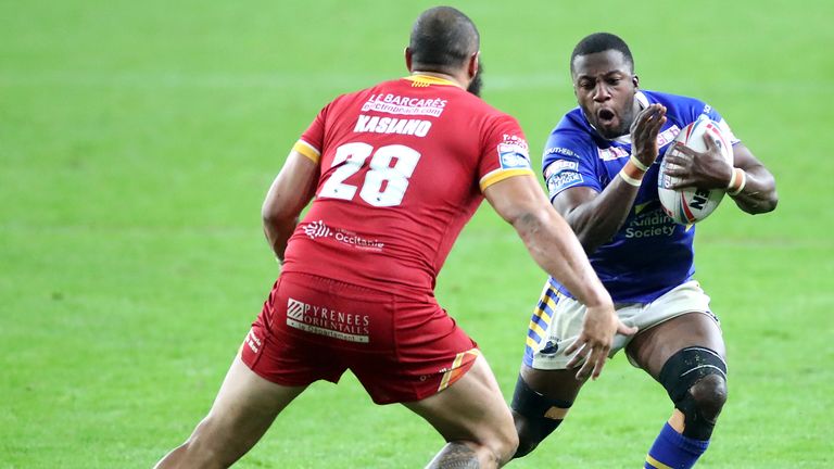 Muizz Mustapha tries  to get get past Catalans Dragons' Sam Kasiano