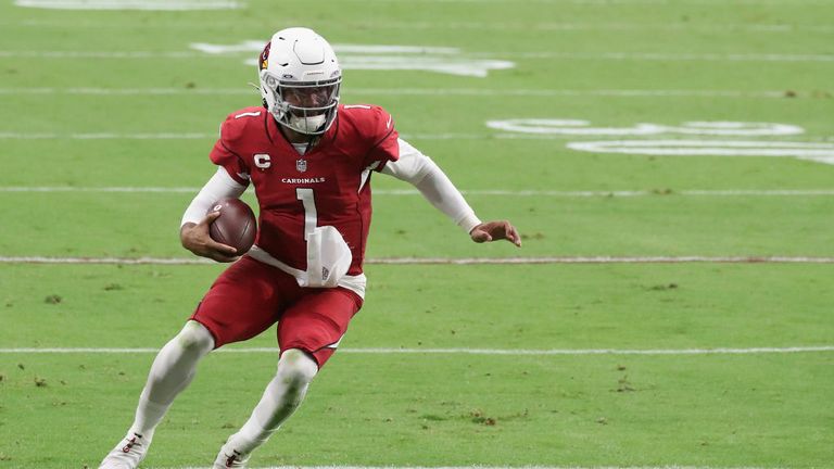 Quarterback Kyler Murray #1 of the Arizona Cardinals carries the football en route to scoring a 14-yard rushing touchdown against the Washington Football Team during the first half of the NFL game at State Farm Stadium on September 20, 2020 in Glendale, Arizona. The Cardinals defeated the Washington Football Team 30-15.