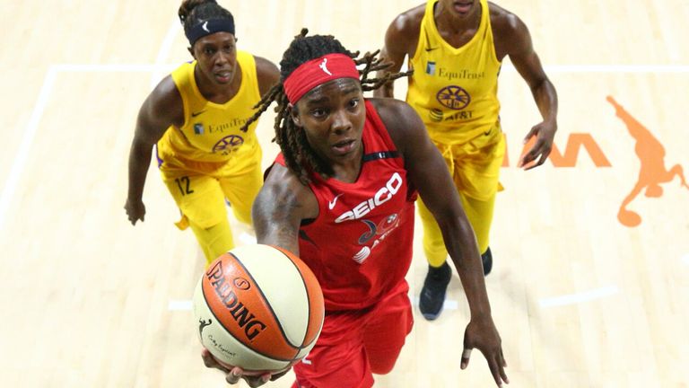 Myisha Hines-Allen rises to the rim to score against the  Los Angeles Sparks