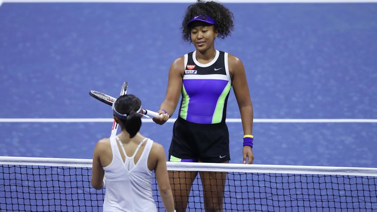 Naomi Osaka of Japan taps rackets after winning during her Women’s Singles first round match against Misaki Doi of Japan on Day One of the 2020 US Open at the USTA Billie Jean King National Tennis Center on August 31, 2020 in the Queens borough of New York City. 