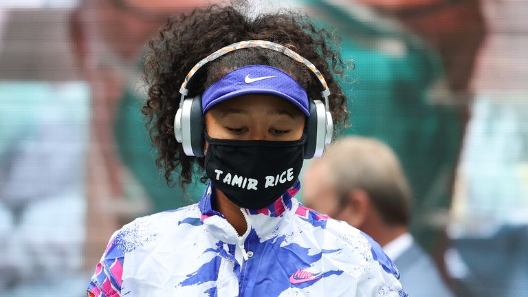 Naomi Osaka of Japan walks on court in front of virtual fans before her Women's Singles final match against Victoria Azarenka of Belarus on Day Thirteen of the 2020 US Open at the USTA Billie Jean King National Tennis Center on September 12, 2020 in the Queens borough of New York City.