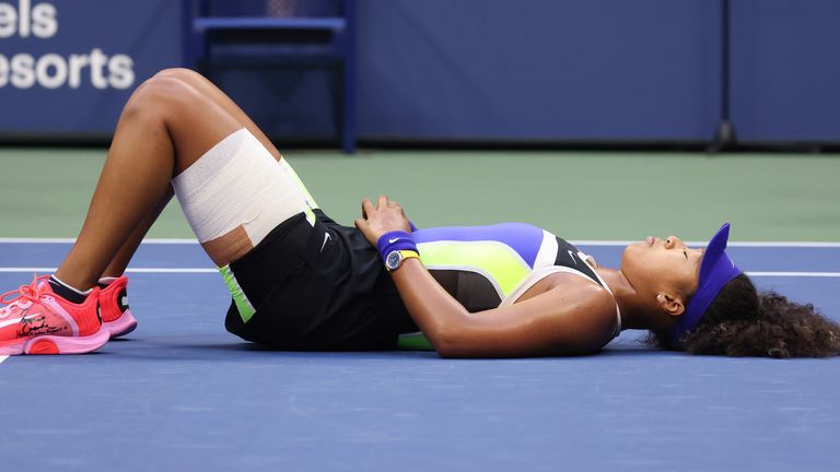 Naomi Osaka of Japan lays down in celebration after winning her Women's Singles final match against Victoria Azarenka of Belarus on Day Thirteen of the 2020 US Open at the USTA Billie Jean King National Tennis Center on September 12, 2020 in the Queens borough of New York City.