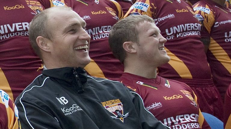 PICTURE BY VAUGHN RIDLEY/SWPIX.COM - Rugby League - Super League - Huddersfield Giants 2010 Team Group & Headshots - The Galpharm Stadium, Huddersfield, England - 27/01/10...Copyright - Simon Wilkinson - 07811267706...Huddersfield's David Hodgson, Brett Hodgson and Nathan Brown have a laugh during the teamshot.