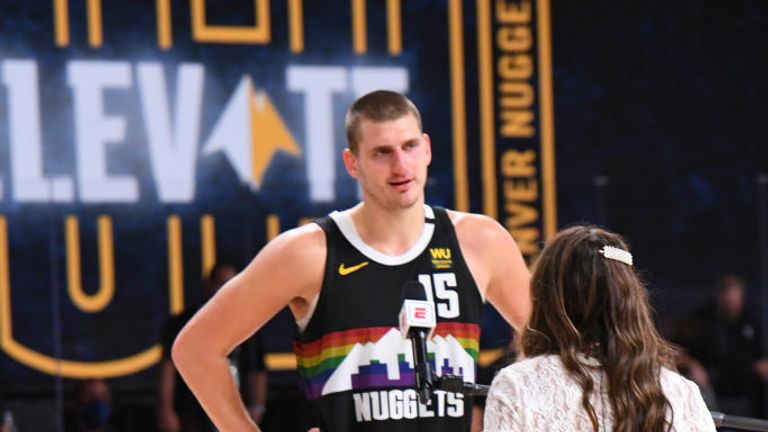 Nikola Jokic #15 of the Denver Nuggets talks with reporter Cassidy Hubbarth after the game during Round One, Game Seven of the NBA Playoffs on September 1, 2020 at AdventHealth Arena in Orlando, Florida. 