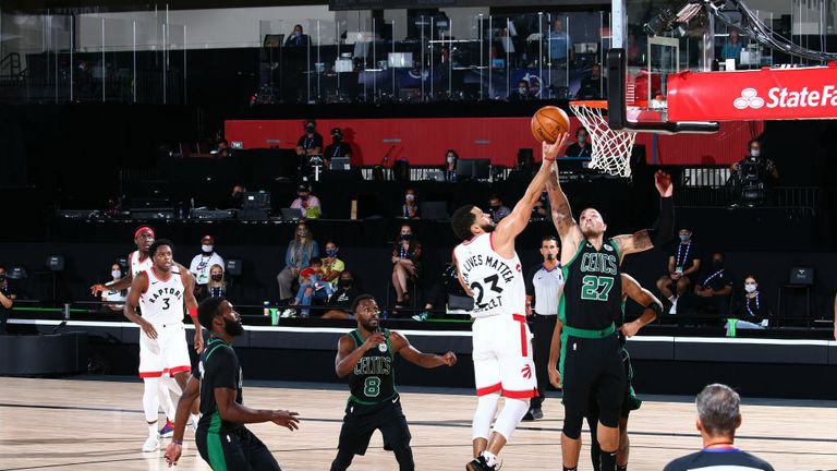 Fred VanVleet #23 of the Toronto Raptors drives to the basket while Daniel Theis #27 of the Boston Celtics plays defense during Game Seven of the Eastern Conference Semifinals of the NBA Playoffs on September 11, 2020 at The AdventHealth Arena at ESPN Wide World Of Sports Complex in Orlando, Florida. 