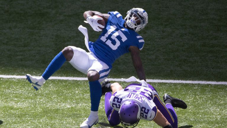 Parris Campbell #15 of the Indianapolis Colts is tackled by Harrison Smith #22 of the Minnesota Vikings during the first half at Lucas Oil Stadium on September 20, 2020 in Indianapolis, Indiana. Campbell was carted off of the field for a knee injury. 