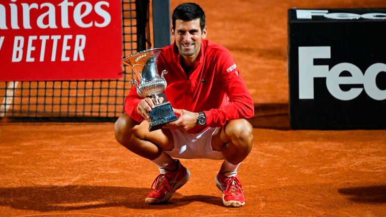 Serbia's Novak Djokovic poses with his trophy after winning the final match of the Men's Italian Open against Argentina's Diego Schwartzman at Foro Italico on September 21, 2020 in Rome, Italy