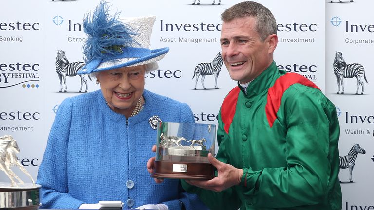 Queen Elizabeth II presented Pat Smullen with his winning Epsom Derby trophy in June 2016