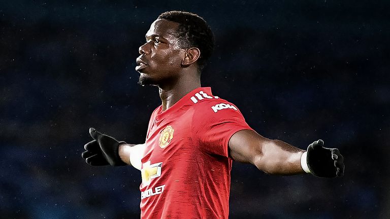 Paul Pogba celebrates after scoring Manchester United&#39;s third goal against Brighton