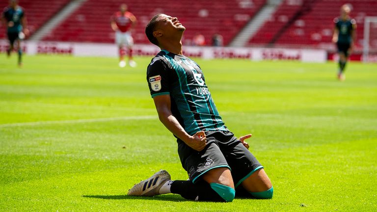 Brewster celebrates scoring for Swansea against Middlesbrough in the Championship in June