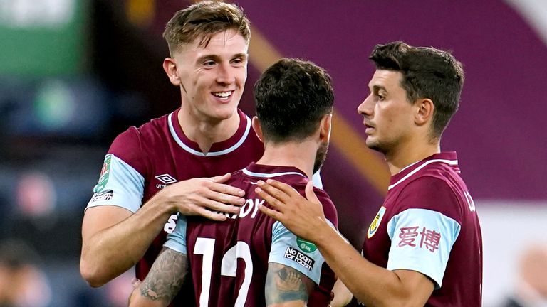 Burnley's Robbie Brady (centre) celebrates scoring the winning penalty with his teammates at the end of the Carabao Cup second round match at Turf Moor, Burnley. 17 September 2020