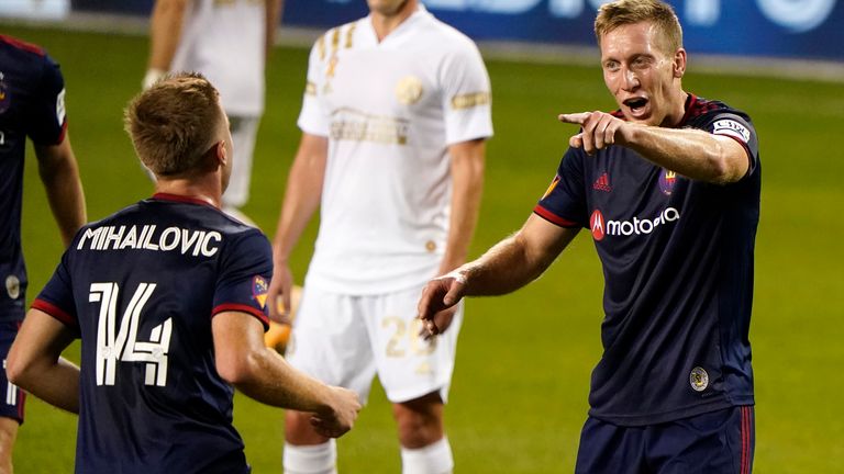 Robert Beric (right) scored for the fourth successive game