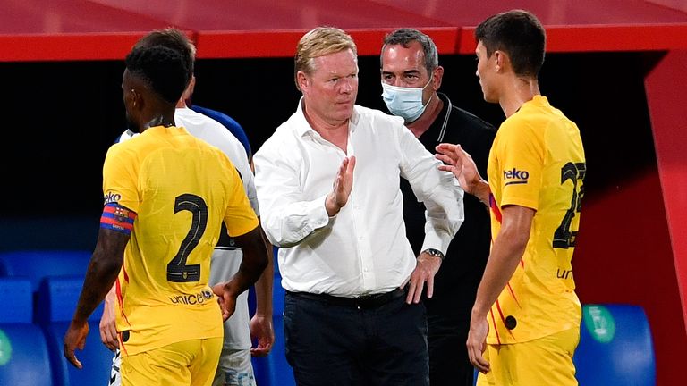 Ronald Koeman congratulates his Barca players at the full-time whistle