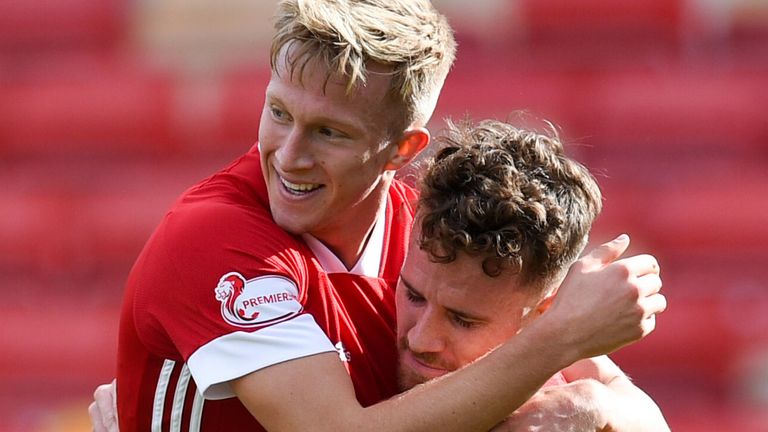 ABERDEEN, SCOTLAND - SEPTEMBER 12: Aberdeen&#39;s Ross McCrorie (L) celebrates making it 1-0 with Marley Watkins during the Scottish Premiership match between Aberdeen and Kilmarnock at Pittodrie on September 12, 2020, in Aberdeen, Scotland. (Photo by Ross MacDonald / SNS Group)