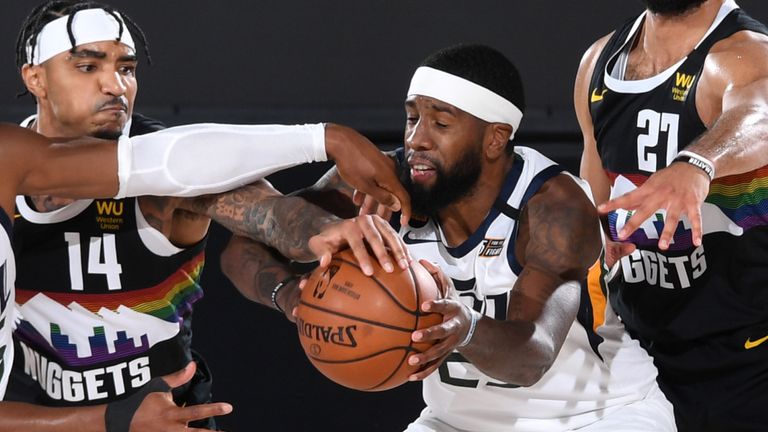 Utah Jazz forward Royce O'Neale wrestles for possession in Game 7 against the Nuggets