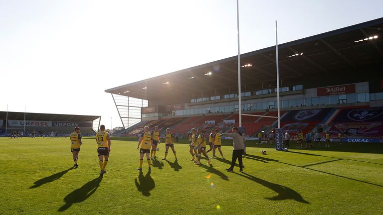 Picture by Ed Sykes/SWpix.com - 19/09/2020 - Rugby League - Coral Challenge Cup Quarter Final - Hull FC v Wigan Warriors - AJ Bell Stadium, Salford, England - Wigan Warriors players warm up before the game