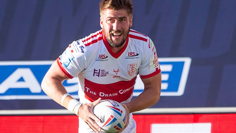 Hull KR's Glen Minikin scores a try against Wigan