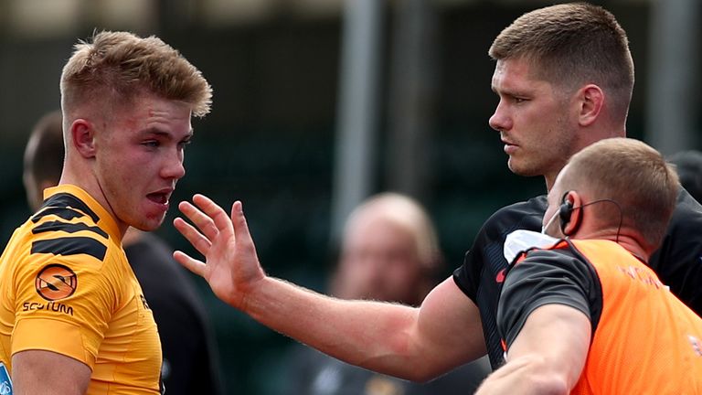 Owen Farrell apologises to Charlie Atkinson of Wasps after being sent off for a dangerous tackle 