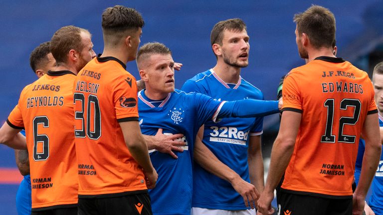 GLASGOW, SCOTLAND - SEPTEMBER 12: The Rangers' players react angrily to a challenge made on Alfredo Morelos by Dundee United's Ryan Edwards during a Scottish Premiership match between Rangers and Dundee United at Ibrox Stadium, on September 12, 2020, in Glasgow, Scotland. (Photo by Alan Harvey / SNS Group)