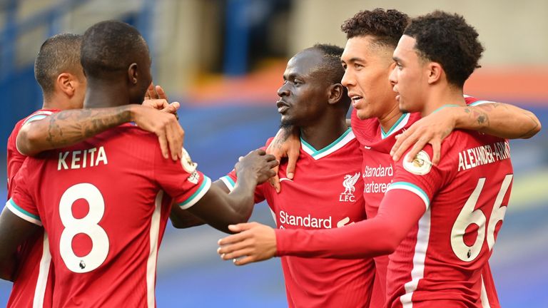 Sadio Mane celebrates with team-mates after scoring the opening goal 