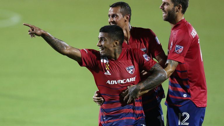 Santiago Mosquera celebrates with his team- mates after scoring his first goal