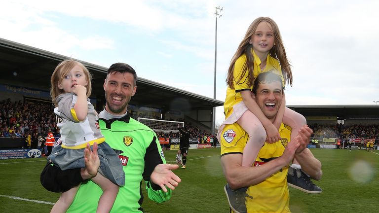 Scott Shearer and John Mousinho during the Sky Bet League Two match between Burton Albion and Northampton Town at Pirelli Stadium on April 25, 2015 in Burton-upon-Trent, England.