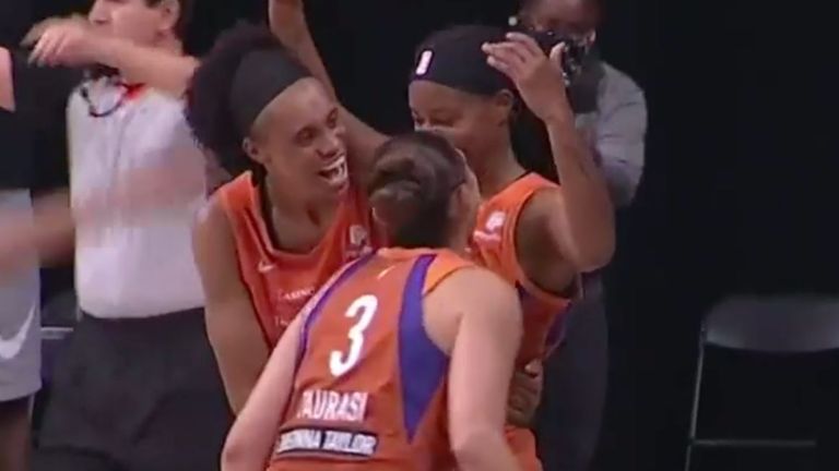 Shay Peddy is mobbed by her Phoenix Mercury team-mates after hitting a game-winning three-pointer at the buzzer