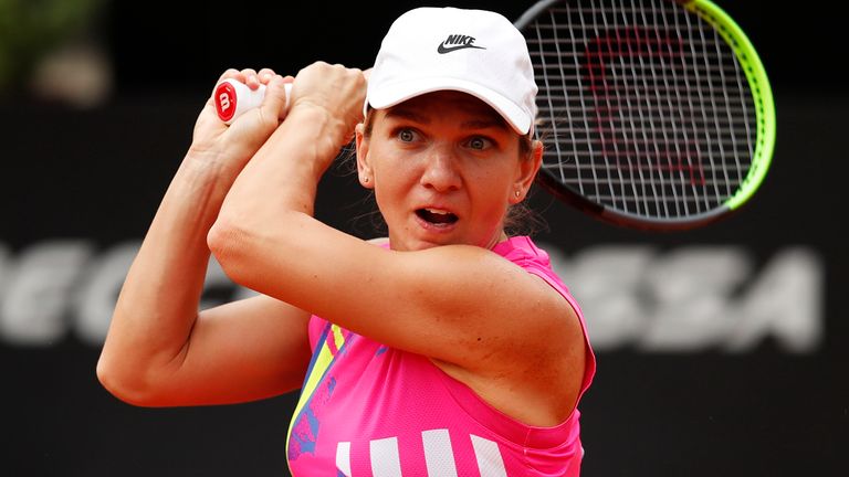 Simona Halep of Romania plays a backhand in her women's final match against Karolina Pliskova of The Czech Republic during day eight of the Internazionali BNL d'Italia at Foro Italico on September 21, 2020 in Rome, Italy.