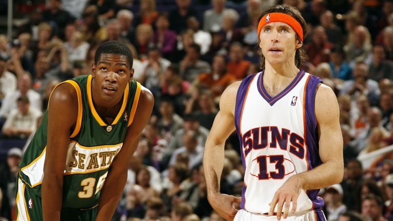Kevin Durant of the Seattle SuperSonics and Steve Nash of the Phoenix Suns catch their breath during the game