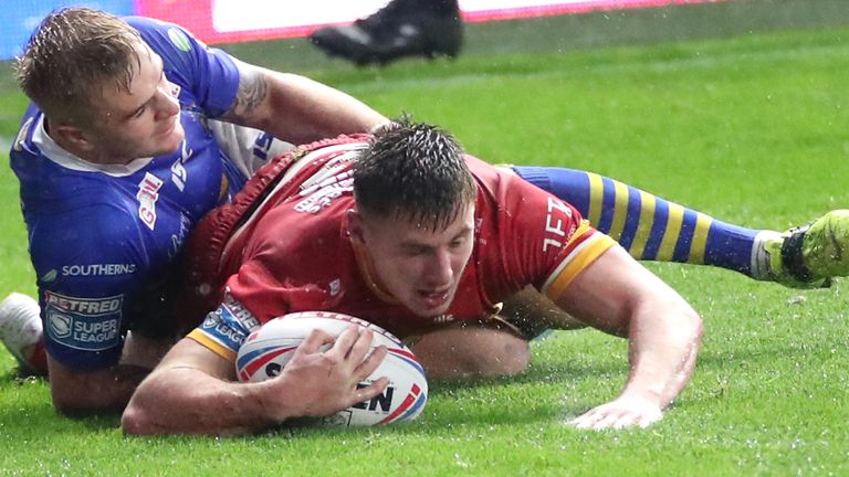 Catalans Dragons' Tom Davies scores his side's third try against Leeds 