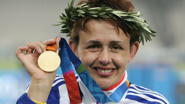 ATHENS - SEPTEMBER 23: Tanni Grey-Thompson of Great Britain recives her Gold after winning 100m T53 at the Athens 2004 Paralympic Games at the Olympic Stadium in Athens, Greece.  (Photo by Phil Cole/Getty Images)