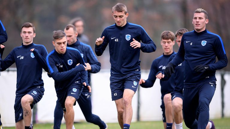 Genk's Timothy Castagne (C) and teammates takes part in a training session on November 23 2016, in Genk, on the eve of the team's Europa League football match against Rapid Wien. 